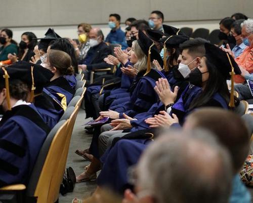Students attend graduation ceremony in 2022