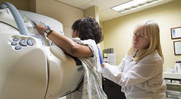 Woman getting mammogram at UW Medicine