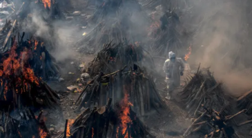 India mass cremation site, photo courtesy Atul Loke for NYTimes