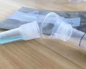 Photo of DNA test spit tube