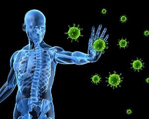 Transparent human figure in blue on black background, arm outstretched to ward off coronavirus spores in green