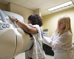 Woman getting mammogram at UW Medicine