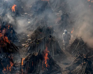 India mass cremation site, photo courtesy Atul Loke for NYTimes