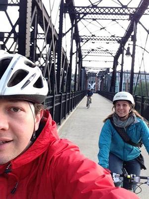 Mauricio Sadinle biking with Kristine.