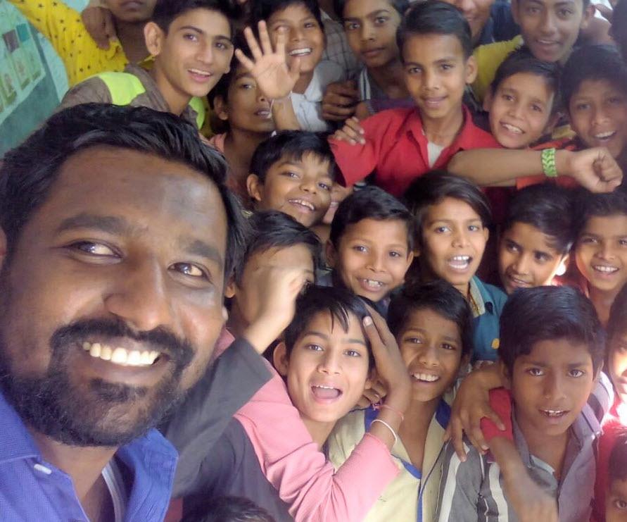 Photo of students posing for picture at Doosra Dashak in India
