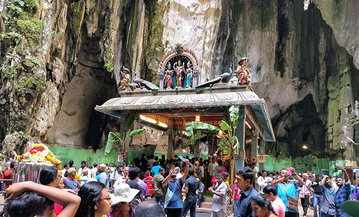 Large crowd of people on annual pilgrimage to the Batu Caves near Kuala Lumpur, Malaysia, for Thaipusam