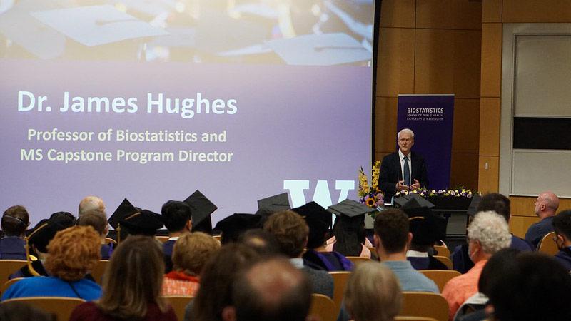 Jim Hughes addresses graduating students in 2022