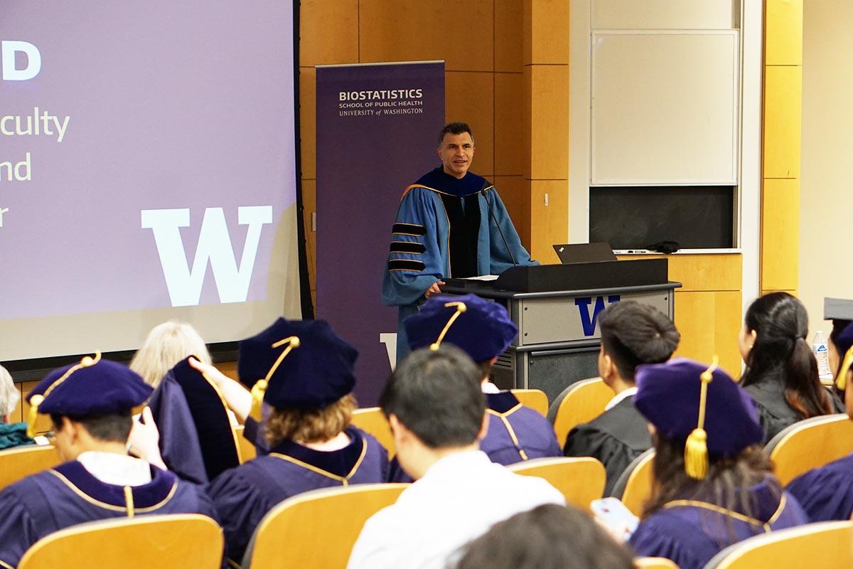 Ali Shojaie, interim department chair and professor of biostatistics addressing graduates during the ceremony