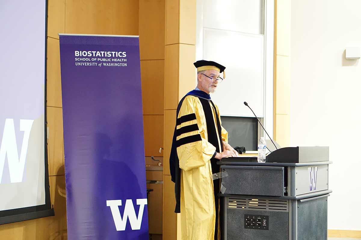 Patrick Heagerty addresses Biostatistics Class of 2026, standing at podium